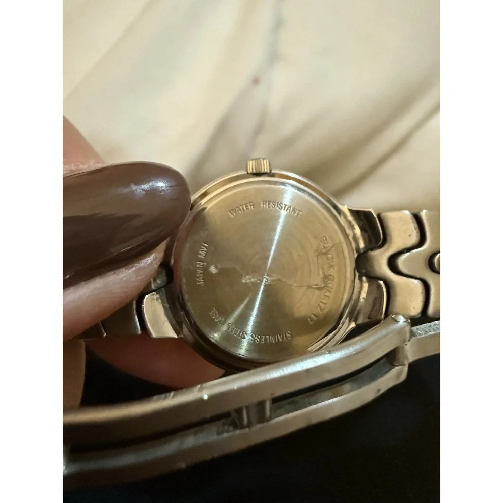 Bulova Women's Stainless Steel Quartz Watch Water-Resistant Date Silver